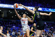Washington Mystics guard Jacy Sheldon (4) has her shot blocked by Dallas Wings center Li Yueru (28) during the first half at College Park Center. Mandatory Credit: Chris Jones (Credits: IMAGN)